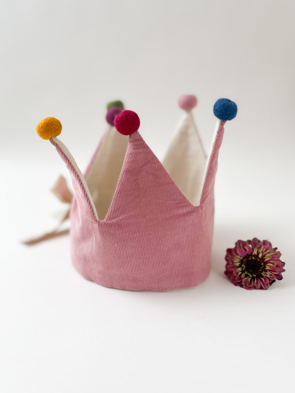 Pink Corduory Crown with Pom Poms